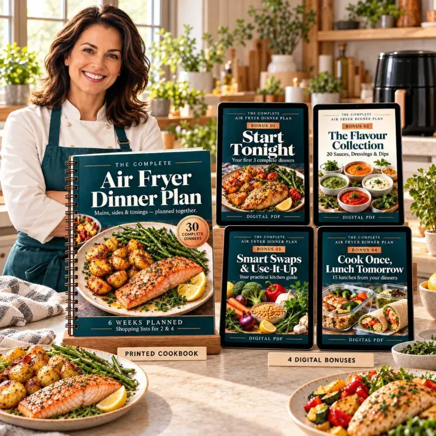 Hand holding the printed cookbook
